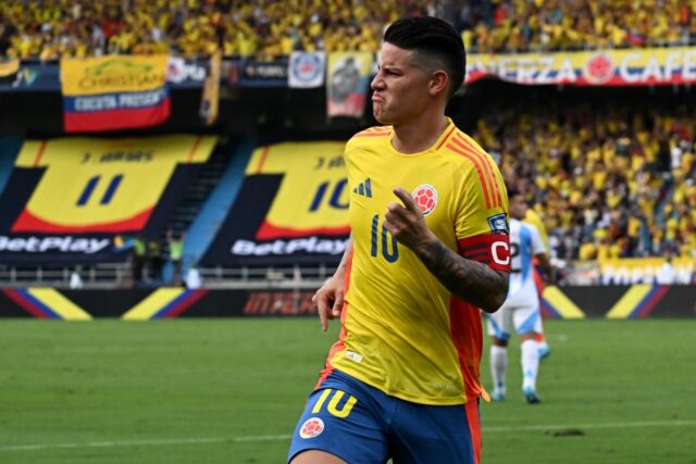 Colombia captain James Rodriguez celebrates after scoring his penalty spot winner against