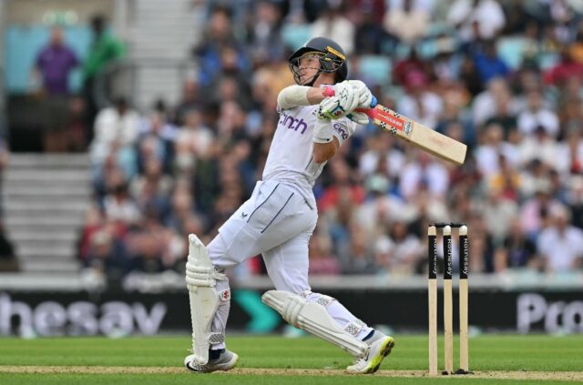 Dismissed: England captain Ollie Pope watches the ball as he is about to be caught for 154