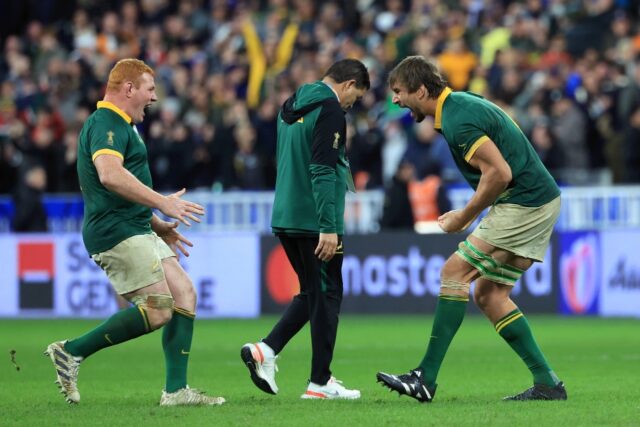 Eben Etzebeth (R) and Steven Kitshoff celebrate after South Africa beat New Zealand in the