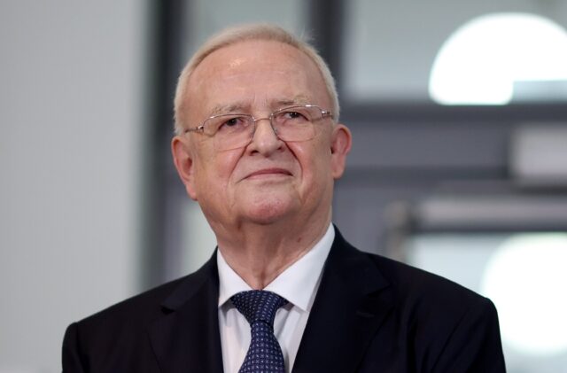 Ex-Volkswagen CEO Martin Winterkorn arrives at the start of his "dieselgate" trial in Brau