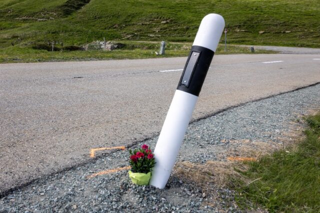 Fans laid flowers by the curve where Gino Maeder suffered a fatal fall during a high-spe