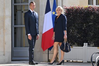 French far-right leader Marine Le Pen urged President Emmanuel Macron to hold a referendum