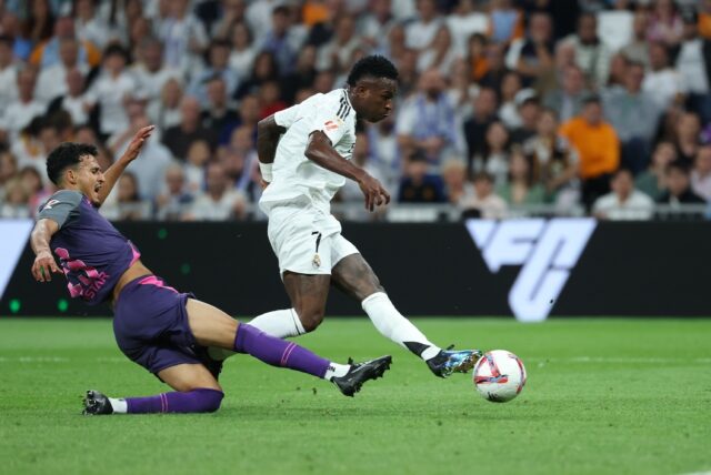 Real Madrid's Brazilian forward Vinicius Junior scores his team's third goal against Espan