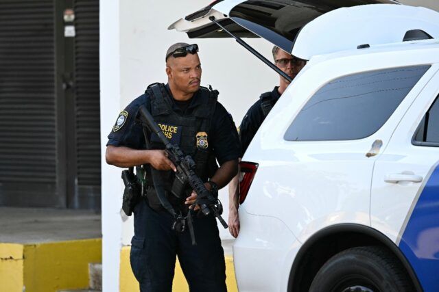 Security outside the federal courthouse for the first court appearance by a man suspected