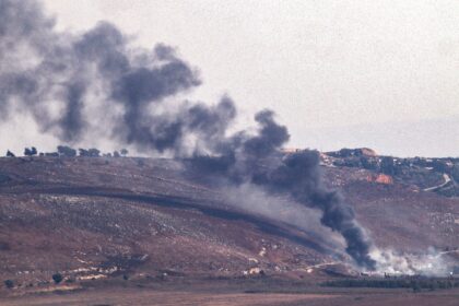 Smoke billows from the sites of an Israeli air strike in Lebanon's southern plain of Marje