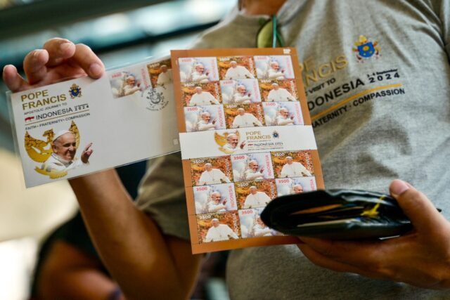 Stamps featuring Pope Francis went on sale at Jakarta Cathedral