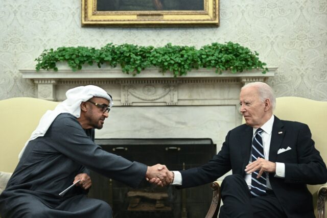 US President Joe Biden shakes hands with President of the United Arab Emirates Sheikh Moha