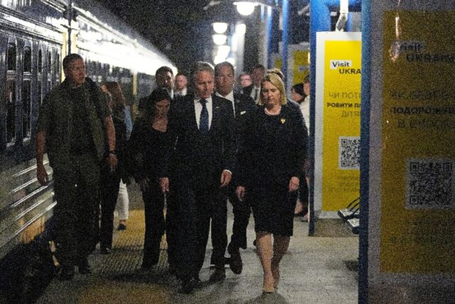 US Secretary of State Antony Blinken walks with US Ambassador to Ukraine Bridget Brink as