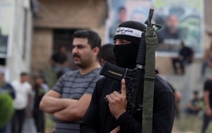 Palestinians bury their dead after Israeli forces pull out of Jenin in West Bank