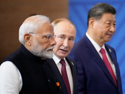 BRICS Summit, Day 2: Putin Scores by Embracing Xi and Modi