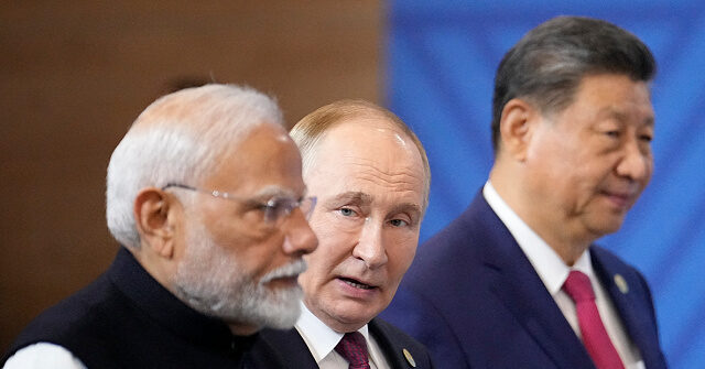 BRICS Summit, Day 2: Putin Scores by Embracing Xi and Modi