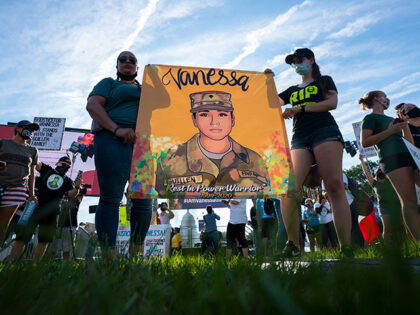 Supporters of the family of slain Army Spc. Vanessa Guillen gather before a news conferenc