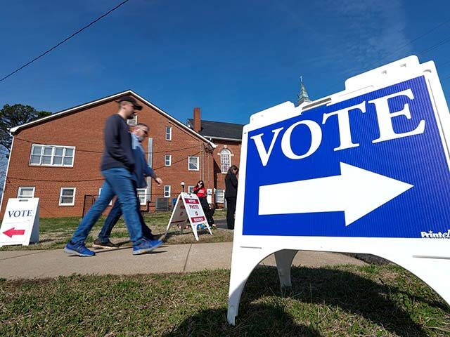 Super Tuesday voters leave a polling location Tuesday, March 5, 2024, in Mount Holly, N.C.