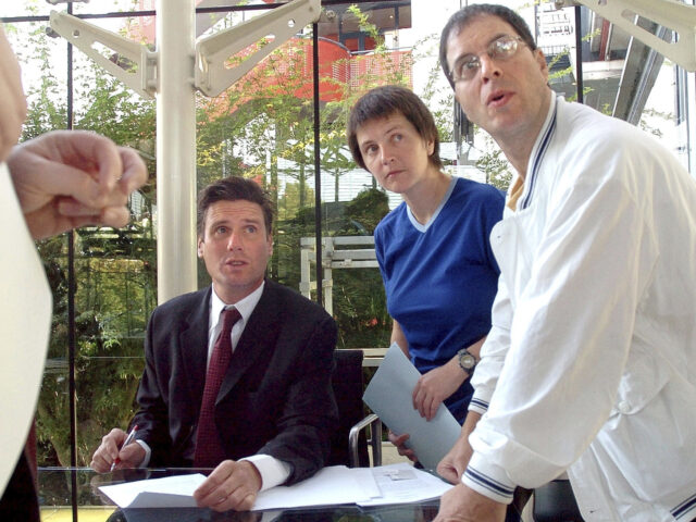 FILE - British environmental activists Helen Steel, second right, and David Morris, right,