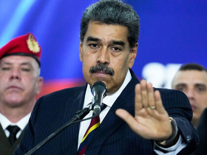 Venezuelan President Nicolas Maduro speaks to the press before leaving the Supreme Court w