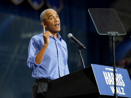 Former President Barack Obama speaks during a campaign rally supporting Democratic preside