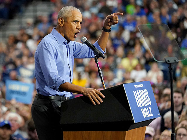 Former President Barack Obama speaks during a campaign rally supporting Democratic preside