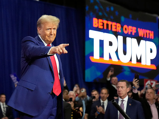 Republican presidential nominee former President Donald Trump arrives at a campaign town h