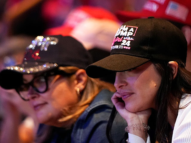 Supporters listen as Republican presidential nominee former President Donald Trump speaks