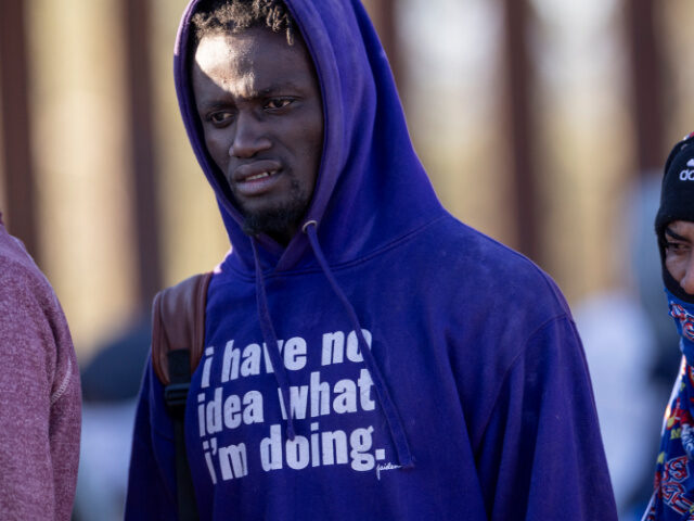 An immigrant from the west African country of Mauritania waits to be processed by U.S. bor