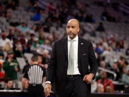 FORT WORTH, TX - MARCH 16: Head coach Amir Abdur-Rahim of the South Florida Bulls walks on