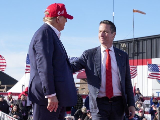 Republican presidential candidate and former President Donald Trump, left, embraces Senate