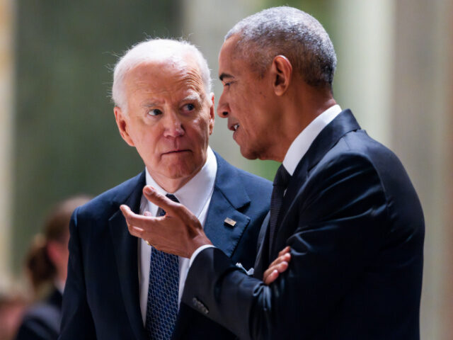 US President Joe Biden, left, and former US president Barack Obama during a memorial servi