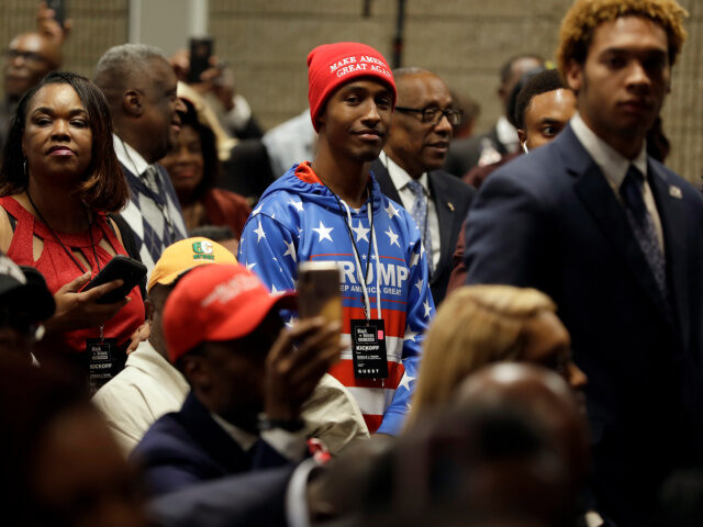 Supporters of President Donald Trump wait to listen to him speak during the launch of "Bla