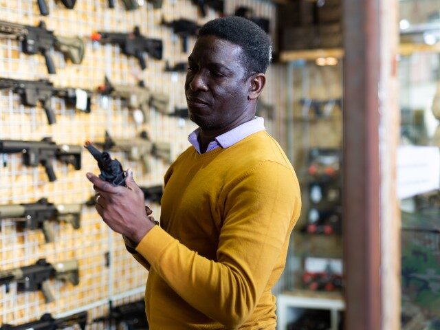 Black man at gun store