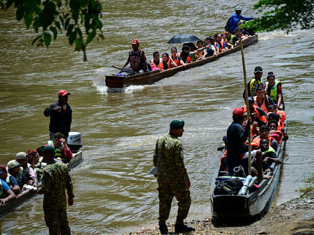 Migrants arrive at the Reception Center for Migrant Care in Lajas Blancas, in the jungle p