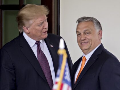 U.S. President Donald Trump, left, greets Viktor Orban, Hungary's prime minister, at the W