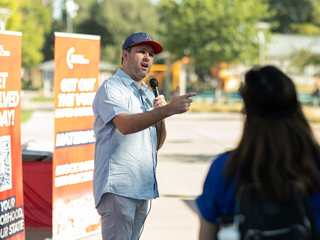 Tyler Bowyer, Chief Operating Officer at Turning Point Action, speaks at a Turning Point G