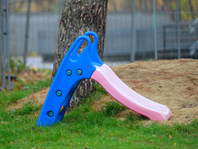 16 November 2022, Lower Saxony, Bad Fallingbostel: A children's slide stands on the p