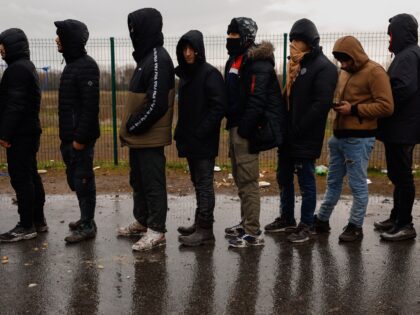 CALAIS, FRANCE - DECEMBER 31: Migrants coming from African and Middle-Eastern countries co