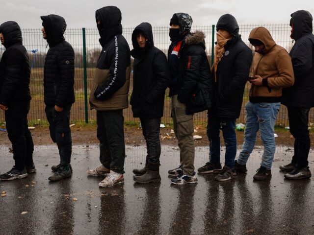 CALAIS, FRANCE - DECEMBER 31: Migrants coming from African and Middle-Eastern countries co