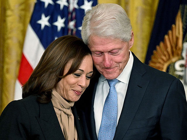 US Vice President Kamala Harris and former US President Bill Clinton attend an event marki