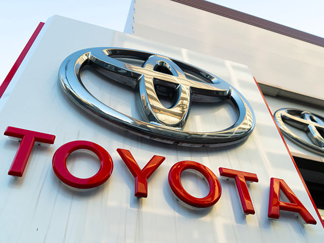 A sign is displayed outside a Toyota Motor Corp. dealership on January 30, 2024 in Tokyo,