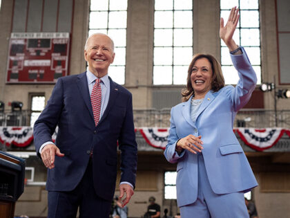 U.S. President Joe Biden and U.S. Vice President Kamala Harris wave to members of the audi