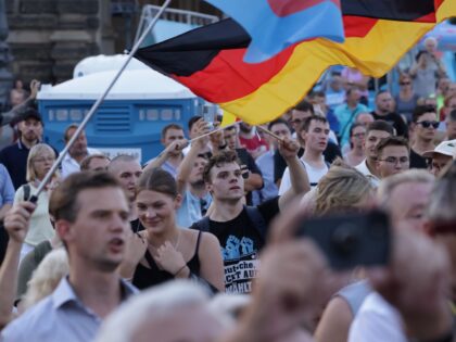 DRESDEN, GERMANY - AUGUST 29: Supporters of the far-right Alternative for Germany (AfD) po