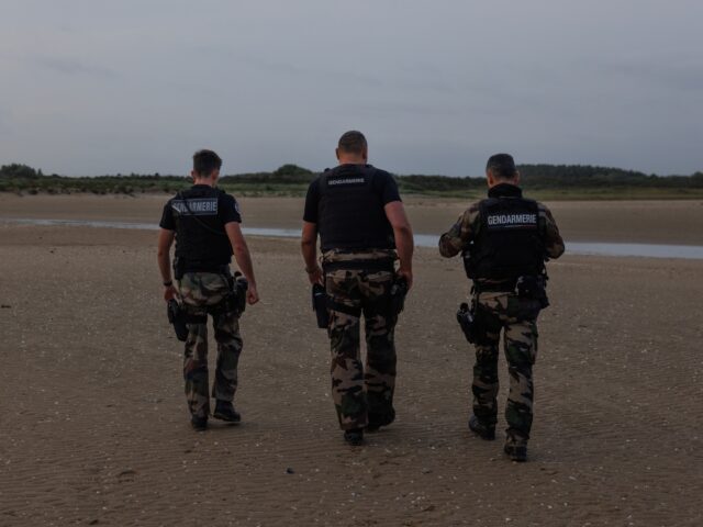 CALAIS, FRANCE - SEPTEMBER 10: Gendarmerie patrol the beach at dawn on September 10, 2024