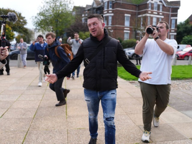 Political activist Tommy Robinson outside Folkestone Police Station, as he has said he has