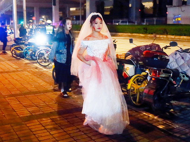 People stage a Halloween Cosplay carnival in Shanghai, China, Oct 27, 2024. (Photo credit