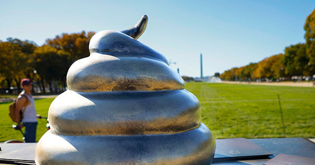 PHOTOS: Giant Poop Statue on Replica of Nancy Pelosi's Desk Installed Outside U.S. Capitol to Remember January 6