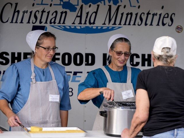 Loaves & Fishes food group serve meals for residents in the aftermath of Hurricane Hel