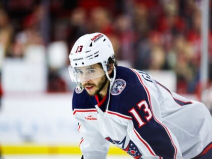 RALEIGH, NC - APRIL 07: Johnny Gaudreau #13 of the Columbus Blue Jackets looks on during t