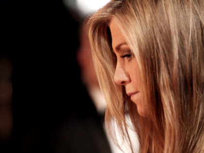 HOLLYWOOD, CA - FEBRUARY 22: Actress Jennifer Aniston backstage at the 87th Annual Academy