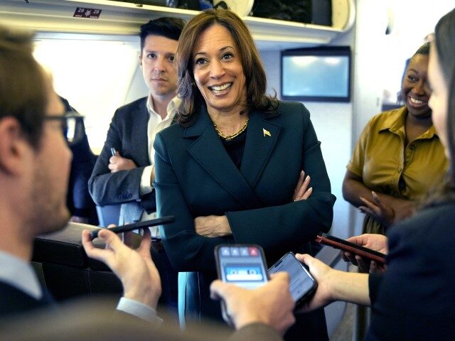 US Vice President and Democratic presidential candidate Kamala Harris speaks with members