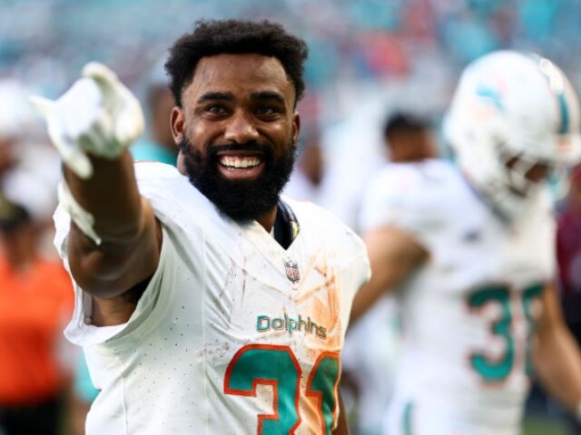 MIAMI GARDENS, FL - DECEMBER 17: Raheem Mostert #31 of the Miami Dolphins smiles during ha