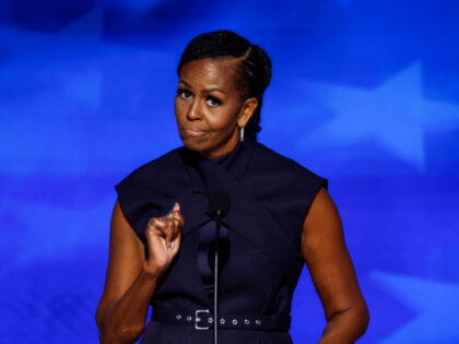 CHICAGO, ILLINOIS - AUGUST 20: Former first lady Michelle Obama speaks on stage during the