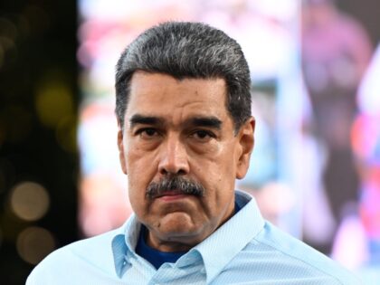 Incumbent President of Venezuela Nicolás Maduro looks forward during the 'Gran March